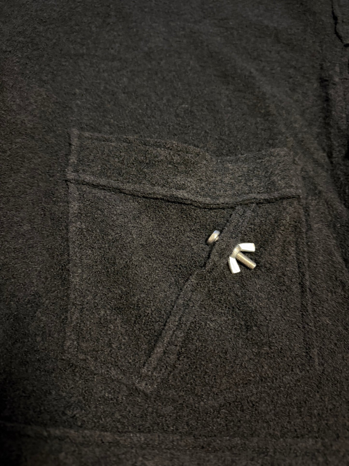 Cowl neck sweater with real metal screw detail