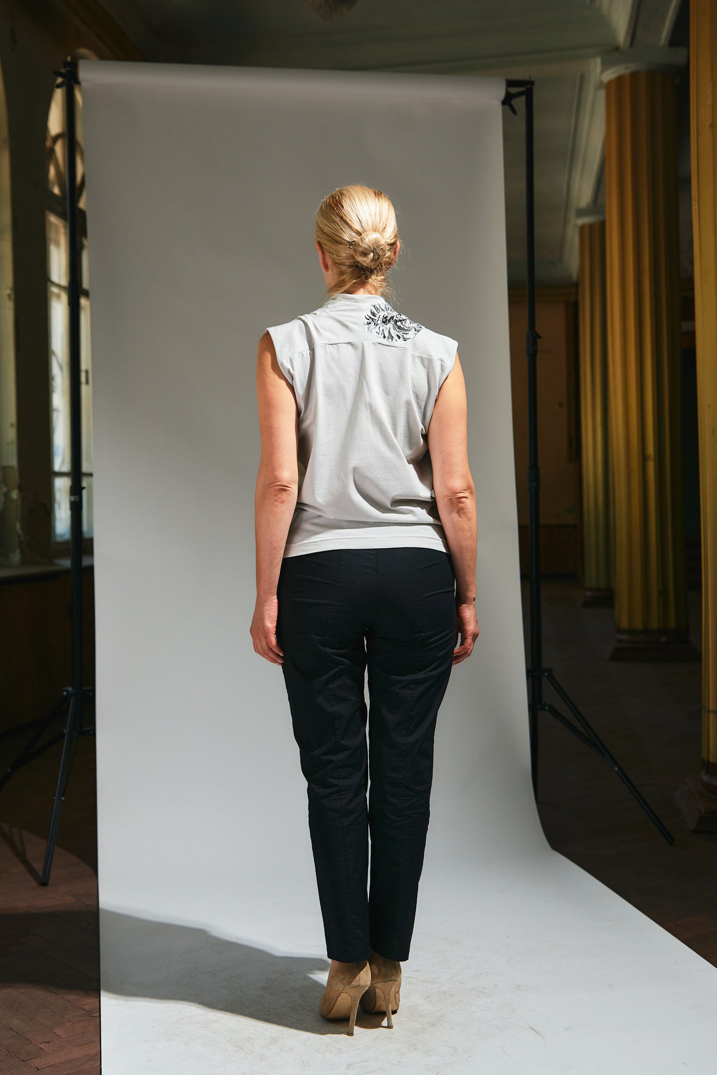 Sleeveless top with wrap front