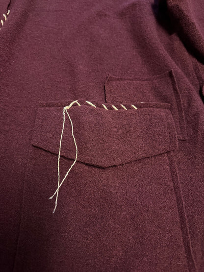 Square top with hand stitching