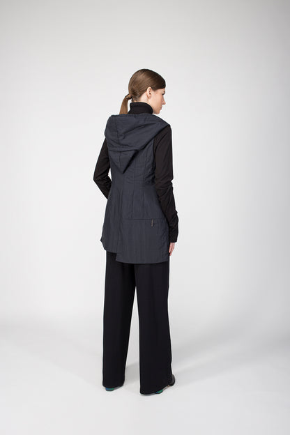 Vest with hood and zipper closure