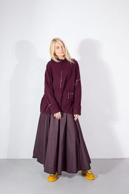 Square top with hand stitching