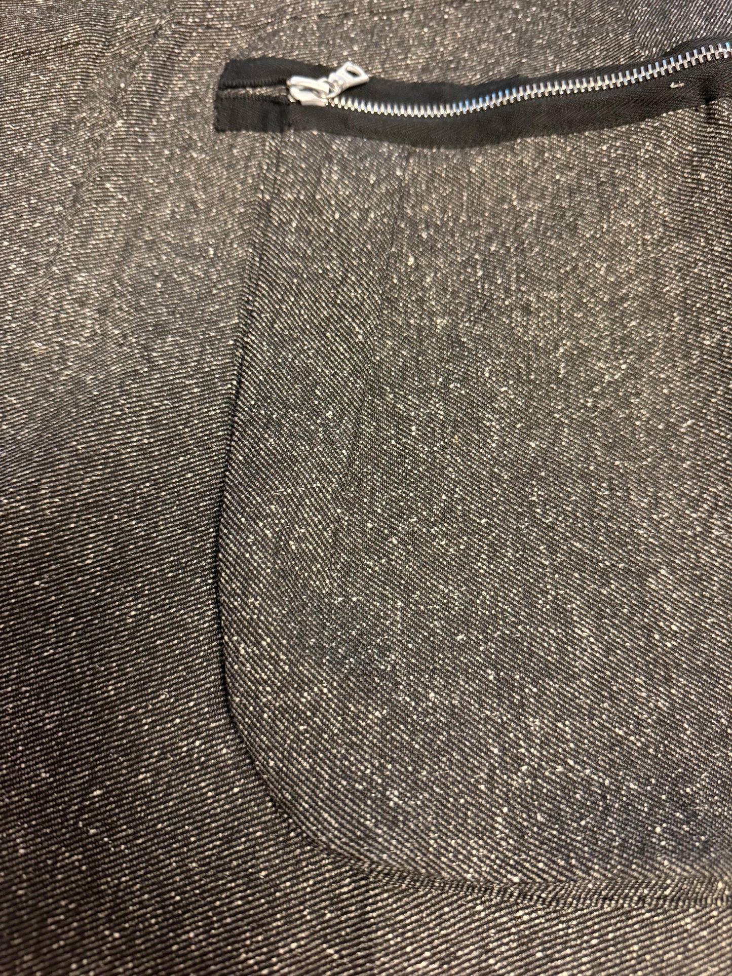 Asymmetrical skirt with front zipper detail