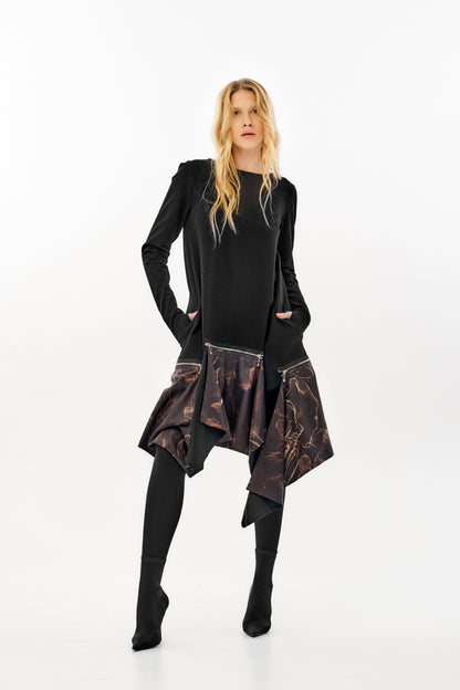 Long sleeve dress featuring a striking asymmetrical hemline