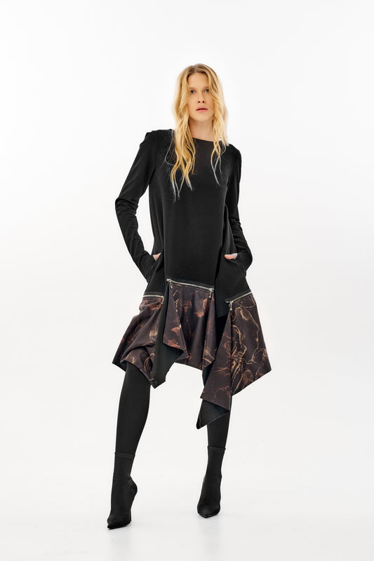 Long sleeve dress featuring a striking asymmetrical hemline