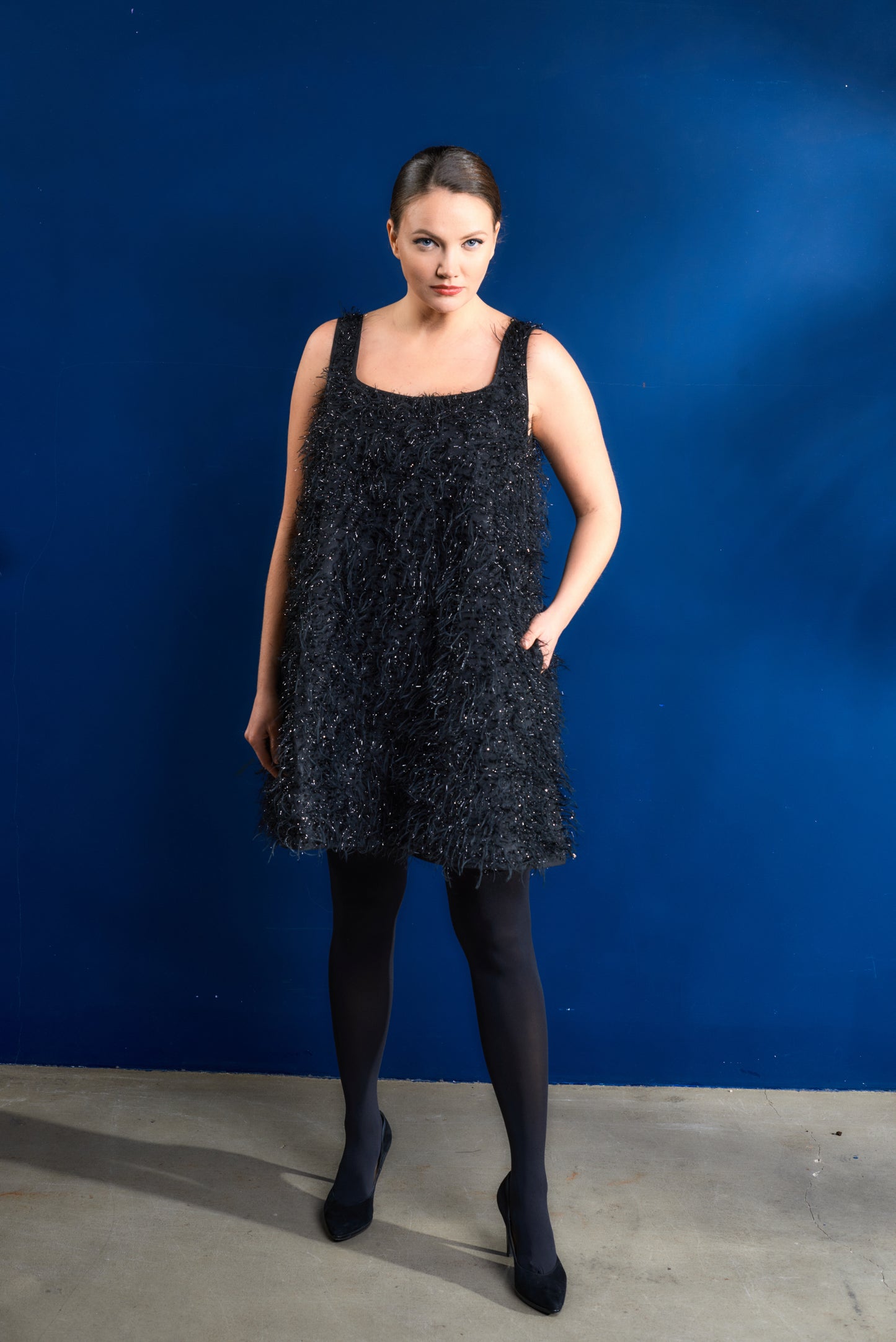 Sleeveless dress with pockets