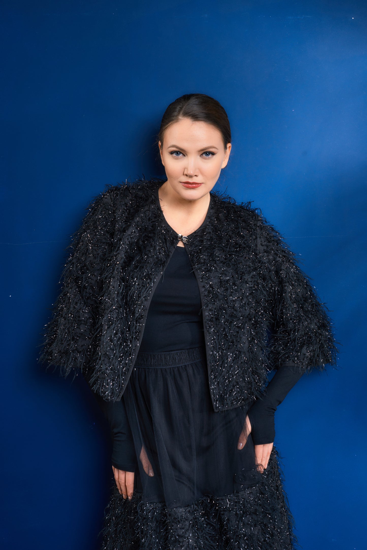 Bolero jacket with metal hook closure