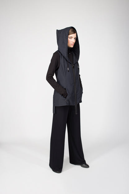 Vest with hood and zipper closure