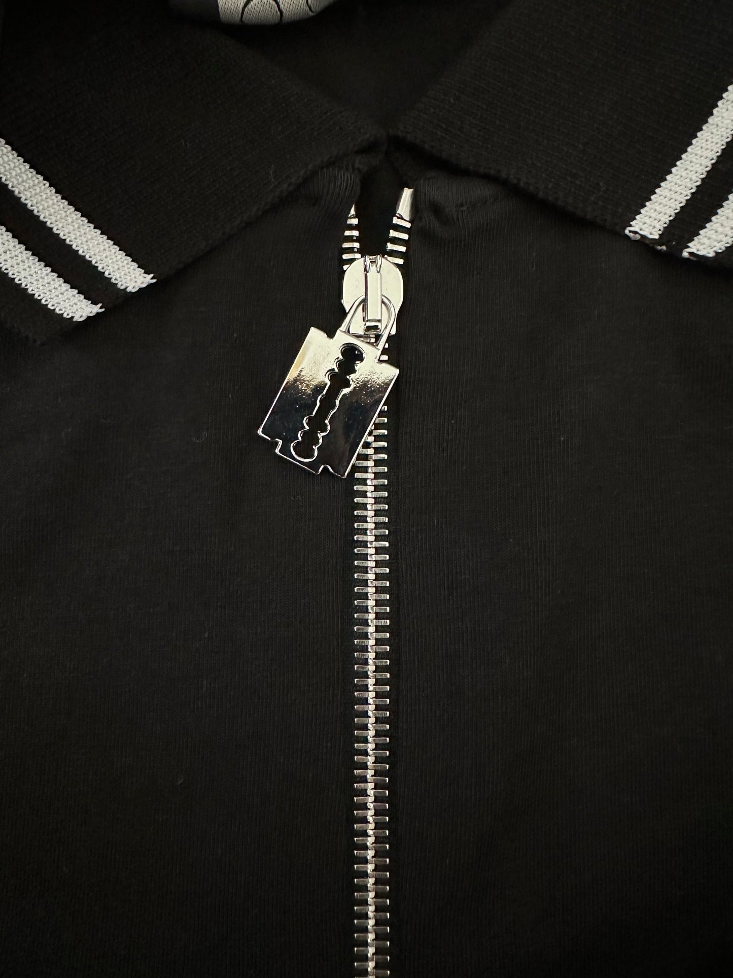 Polo top with blade puller zipper front |  NY77DESIGN