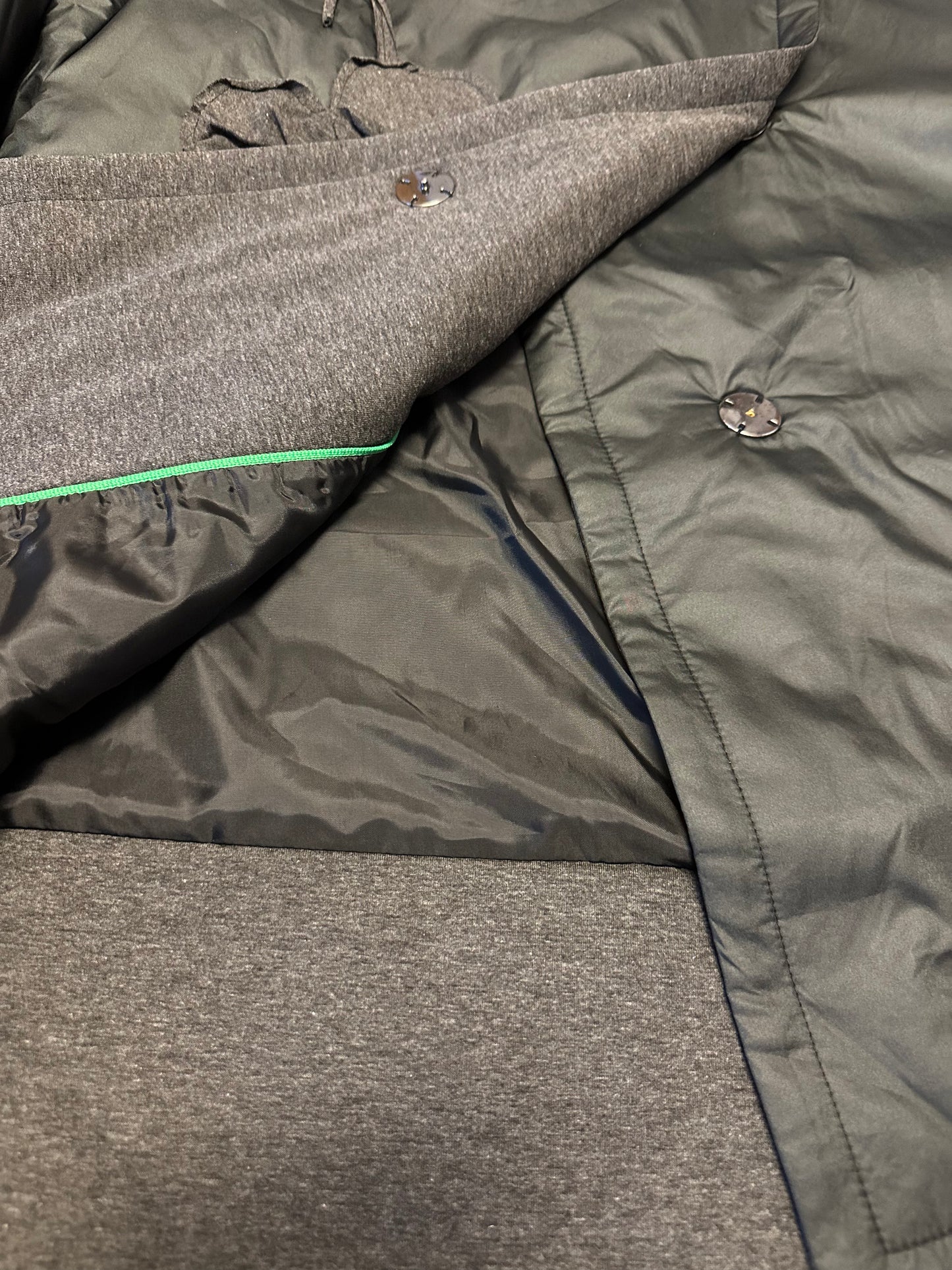 Jacket asymmetrical with hand sewing details