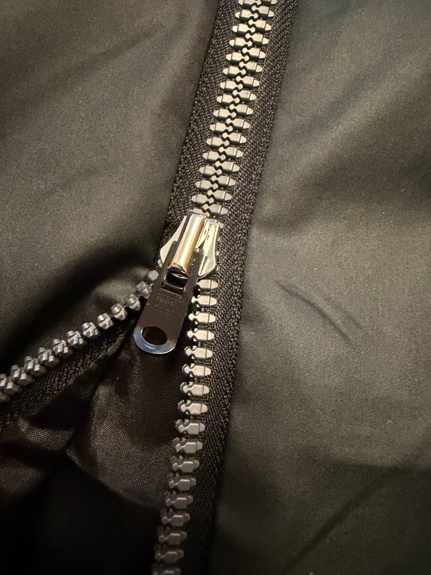 Layered vest with zipper closure