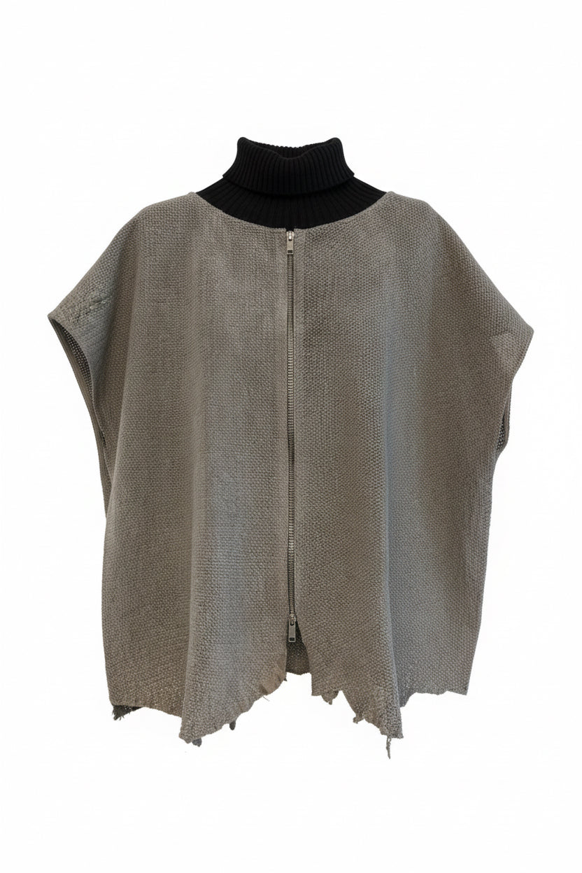 Gray fabric piece on a white background. perforated leather vest with knitted neckline and zipper front